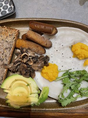 Vegan friend egg! Really good sausages.  at The Sister in Brussels