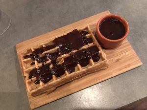 Vegan waffle with chocolate sauce at The Sister in Brussels