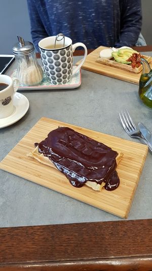Waffle with chocolate and with vegan mozzarella, avocado and dried tomatoes at The Sister in Brussels