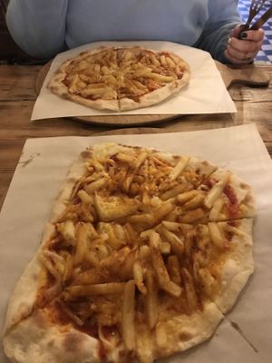Veggie (top) and vegan varieties of the same pizza at Pizza Loft in Krakow