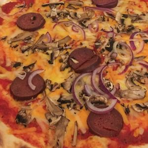 Mushrooms close up at Pizza Loft in Krakow