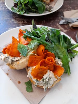 Carrot lox and cashew cream cheese on muffins. Salad was fresh. at The Old Electric Shop in Hay-on-wye