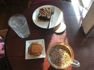 Vegan Mocha, mocha cake, and cinnamon pumpkin muffin at Agora Downtown Coffee Shop in Fredericksburg