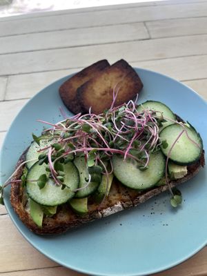 Avocado toast with a side of tofuu  at Verde Juice Bar in Winnipeg
