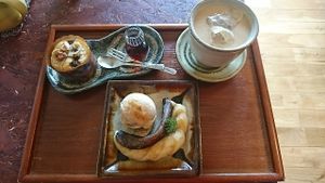 Baked banana w/ soymilk icecream and Walnut, banana & carob muffin and Chai. All vegan. at Kuriya in Hamamatsu