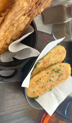 Hash  browns and of course a side of facon   at Particle Cafe in Avondale Heights