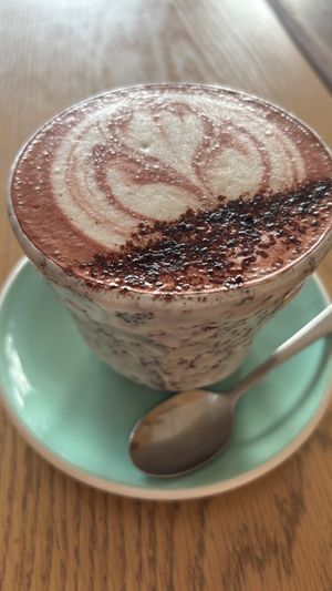 Red velvet latte with macadamia mylk   at Particle Cafe in Avondale Heights