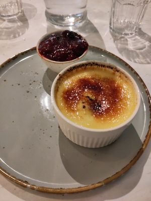 Crème Brulee with berry compote at Stem & Glory in Cambridge