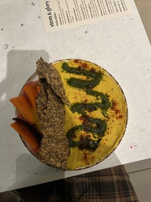 Turmeric hummus with seed crackers   at Stem & Glory in Cambridge