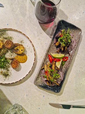 Starter - blue corn taco shells filled with crispy king oyster mushroom ‘fish’, pickled carrots & red cabbage, red fox carlin bean, lime & ginger kohlrabi, sriracha & wasabi ma at Stem & Glory in Cambridge