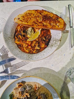 Main - aromatic Cioppino,
rich & delicious sea spiced Italian stew with hearts of palm, oyster mushrooms, tofish, baby mushroom ‘scallops' cooked in a bright, aromatic tomato & w at Stem & Glory in Cambridge