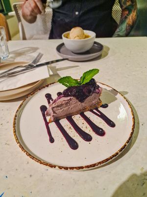 Desserts - almond & pear crumble
with vanilla ice cream (in the background)
and
raw raspberry cheese cake with berry compote #Veganuary at Stem & Glory in Cambridge
