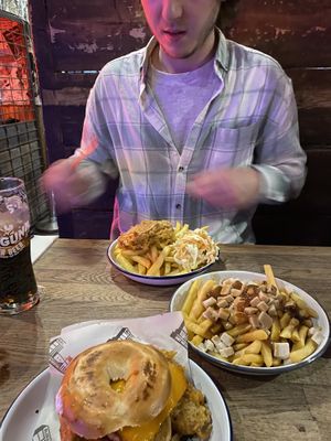 Spicy Fried ‘chicken’ bagel, poutine and fried ‘chicken’ and chips  at Bloc Bar Glasgow in Glasgow