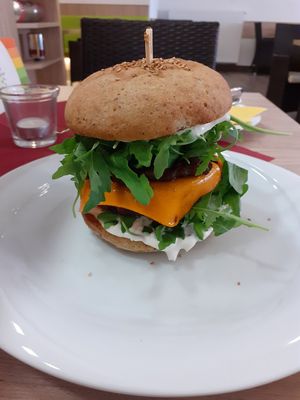 Burger with beetroot, mayo, rocket salad and cheese at Slunce in Ceske Budejovice