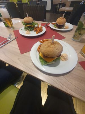 Three different burgers: Slunce Burger (on the left), Bacon and Cheese Burger (in the middle) and a Beetroot Burger at Slunce in Ceske Budejovice
