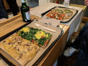 Four vegan pizzas and vegan beer. at Hank Vegan Pizza in Paris