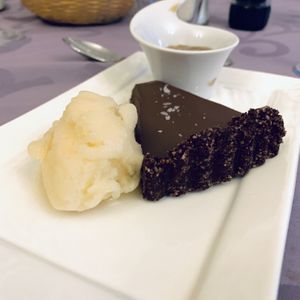 Sorbet pear ice, chocolate cake & salted caramel “butter”.  at Le Cheval Blanc  in Saint-antonin-noble-val