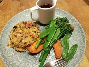 lentil loaf with gravy, yams and green veggies  at Acton & Sons in Belfast