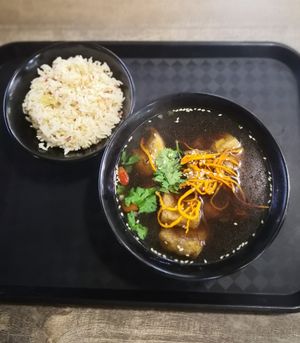 Herbal soup with rice at FIREFLY 萤火虫 by Thunder Tree in Central Singapore