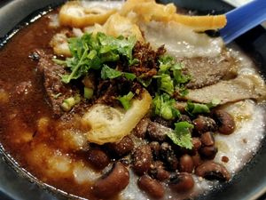 king oyster mushroom porridge 杏鲍菇粥. excellent!  at FIREFLY 萤火虫 by Thunder Tree in Central Singapore