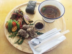 puffed quinoa crusted tofu and Hokkaido pumpkin ‘non-fried’ croquettes with homemade brown sauce + miso sautéed aubergines and green & red peppers + runner bean, cherry tomato and orange AEMONO salad + grilled cucumber and beetroot with sesame and sweet soy + sweet corn and charred courgette brown rice CHIRASHI-ZUSHI with lemon ? + spicy brown lentil and leak tomato soup at Namban Oporto Kitchen Cafe in Porto