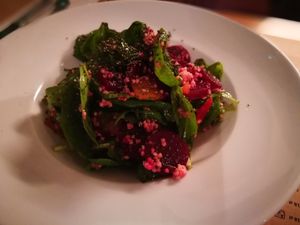 First course: roasted beetroot: spinach, millet, chia seeds, lemon, olive
 at Freta 33 in Warsaw
