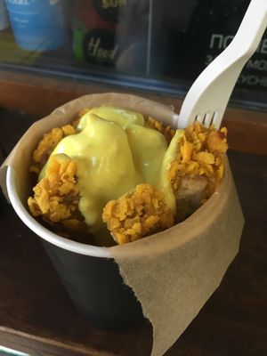 Nuggets (crispy tofu) with vegan cheese sauce  at Hood - Konyushennaya in St Petersburg