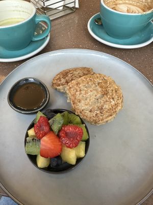 Vegan pancakes with maple syrup and fruits  at Mr. Fox in Riga