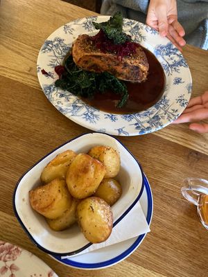 Vegan Wellington with roast potato side dish at The Perch in Oxford