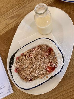 Vegan fruit crumble with soy custard  at The Perch in Oxford