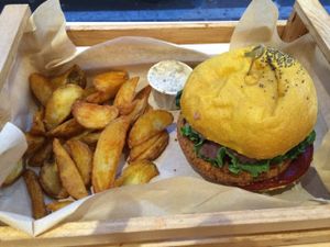 vegan spicy burger with French fries  at Flower Burger in Monza