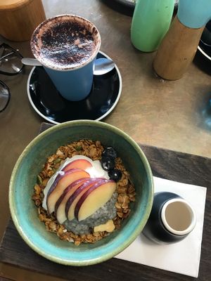 Granola with chia, coconut cream + fruit. Chilli + coconut milk hot chocolate  at The Patch in Mullumbimby