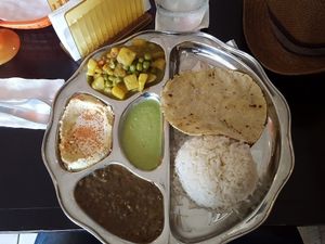 The Thali dish, substituted the Raita for hummus and asked for no butter on the  chapatti at Cafe Namaste in Jaco
