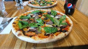 one of the vegan pizza at Americana Pizzeria in Helsinki