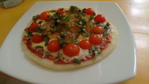 arepa + pizza = arepizza at Cafe Tropico in Taganga