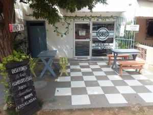 Front, opposite the football pitch  at Cafe Tropico in Taganga