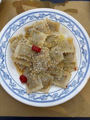 Ravioli with curry chickpea stuffingg  at In Pasta in Lucca