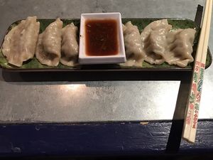 Vegetable dumplings with chili sauce. Very good! at Gypsy Cafe in Lincoln
