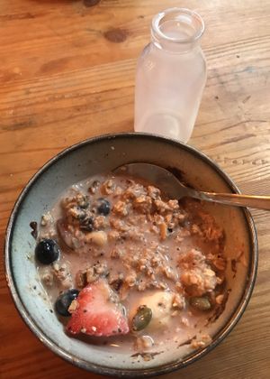 The empty oat milk bottle I’d had to ask for to make the ‘porridge’ bowl edible    at Tofurei in Norwich