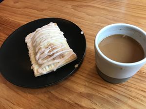 Mango raspberry pop tart and delicious coffee at Esquina in Montreal