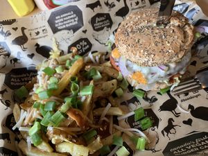 Southwest crunch burger (on a GF bun) with poutine.  at Boon Burger Cafe in Guelph