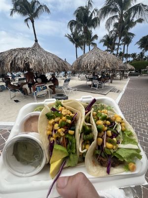 Three different fillings tacos- sweet potato, black beans and legumes which came with guacamole and vegan chipotle mayo   at Eduardo's Beach Shack in Palm Beach