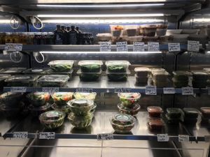 To-go case of prepared food items  at Meraki Juice Kitchen  in West Palm Beach
