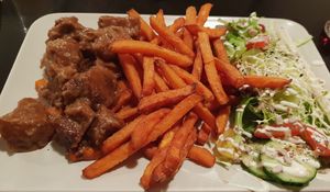Flemish stew and sweet potato fries at De Plaats in Bruges