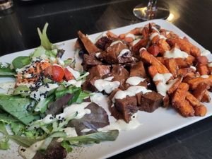 flemish stew with sweet potato fries at De Plaats in Bruges