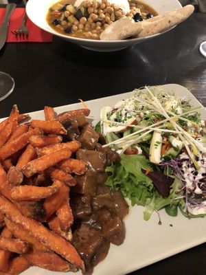 Seitan Flemish stew and chickpea stew with soy yoghurt at De Plaats in Bruges