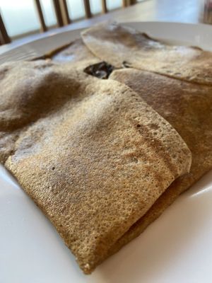 Zucchini curry + mushroom galette  at Creperia La Bombarde in Porto