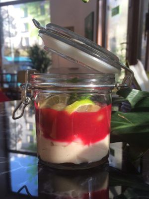 Rice pudding and sauce with forest fruits. at Go Healthy in Krakow