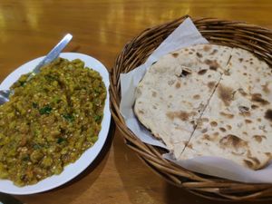 Eggplant dish with nan bread at Govinda's Restaurant in Krabi