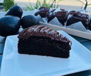 Daily variety of Vegan & GF cake slices. (Pictured: Chocolate Avocado Cake w/ Chocolate Avocado Frosting.) at Cafe YOU in Cape Coral